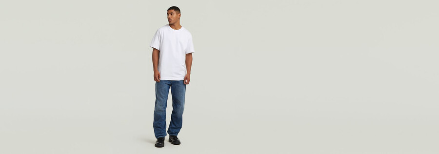 jeans larghi ad arco
