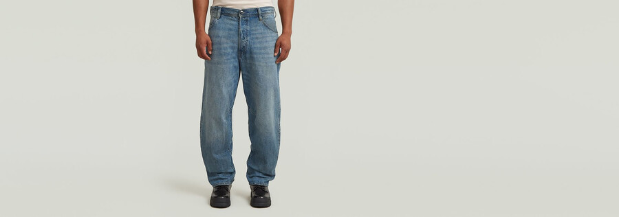 jeans larghi ad arco