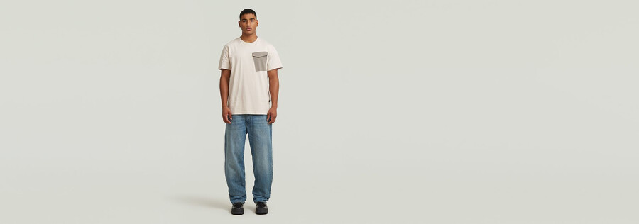 jeans larghi ad arco