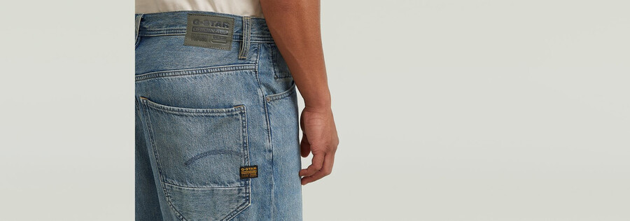 jeans larghi ad arco