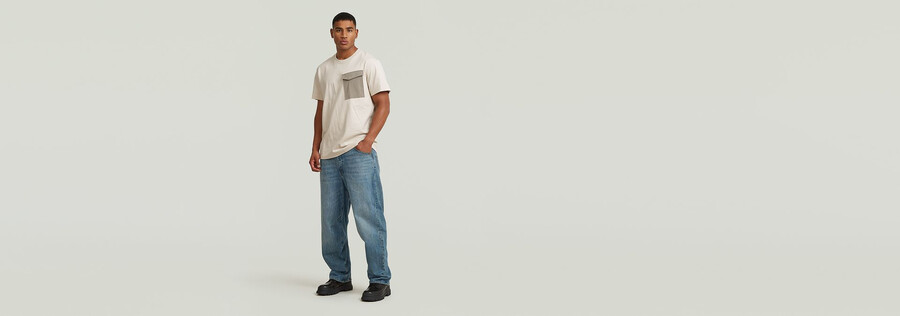 jeans larghi ad arco