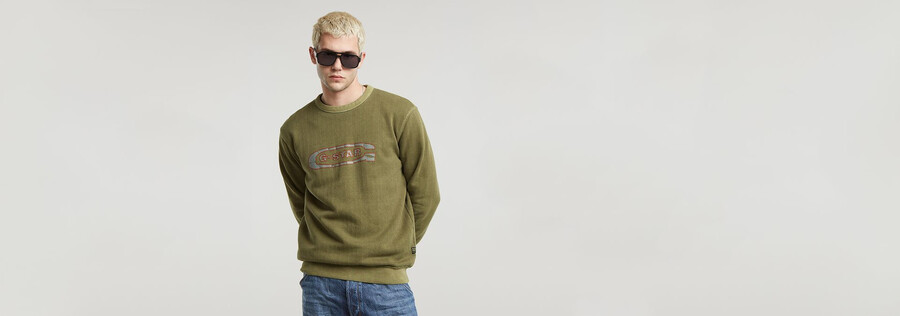 maglione lavato con logo g distrutto