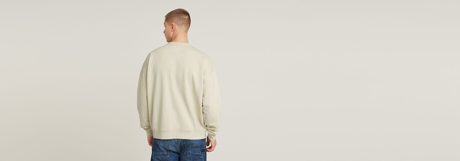 maglione largo in ciniglia con scritta g