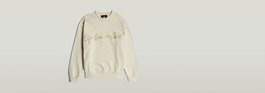 maglione largo in ciniglia con scritta g
