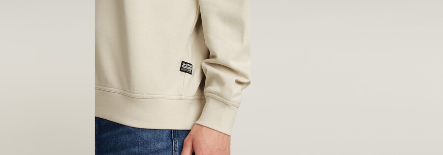 maglione largo in ciniglia con scritta g