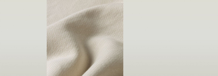 maglione largo in ciniglia con scritta g