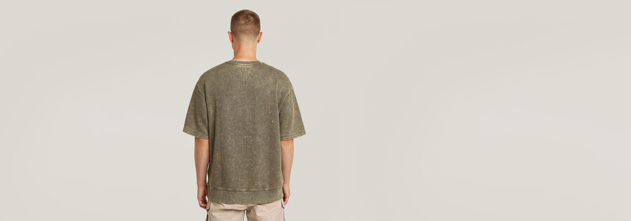 maglione largo con lavaggio acido