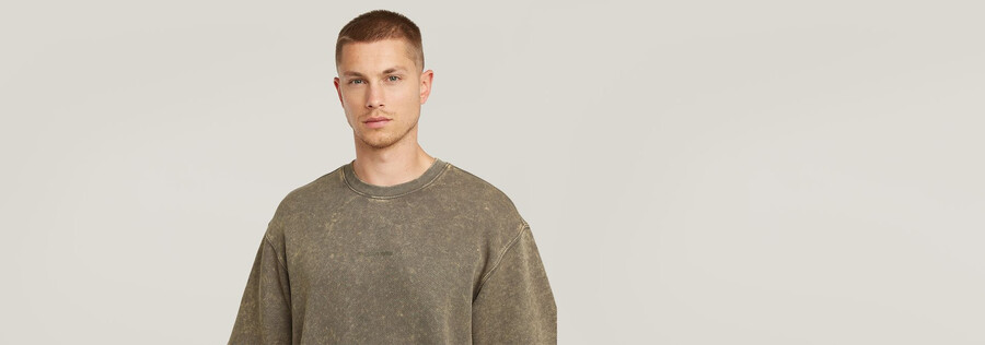maglione largo con lavaggio acido