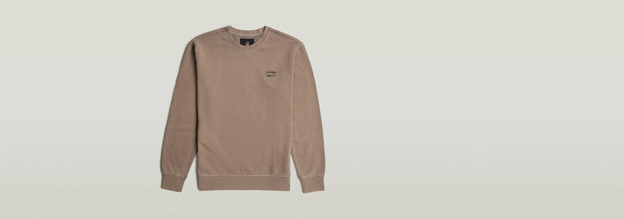 maglione con logo sovratinto