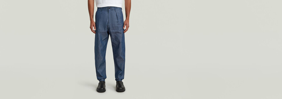 jeans chino plissettati e affusolati