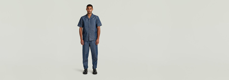 jeans chino plissettati e affusolati