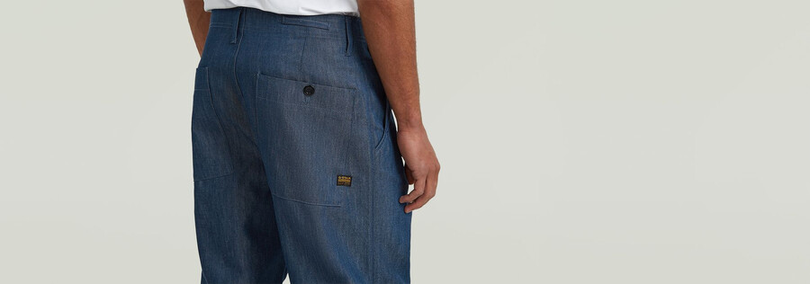 jeans chino plissettati e affusolati