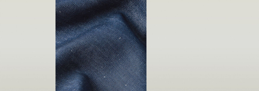 jeans chino plissettati e affusolati